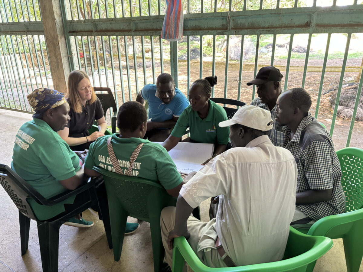 ILRI and partners support Kenyan smallholder fish farmers with training on disease monitoring and boosting productivity 2 Dr Katie Fiorella leads a discussion on disease reporting for cage farmers at Ogal Beach, Kisumu County, Kenya
